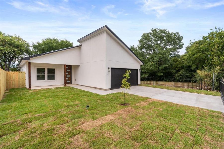 Front exterior of a new home in , Dallas, TX, highlighting curb appeal (Image 2). Front exterior of a new home in , Dallas, TX, highlighting curb appeal (Image 2).