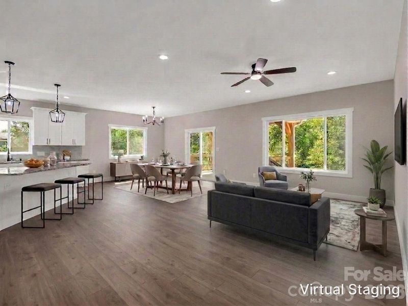 Open floor plan (kitchen, dining and living) hardwood floors, granite counters, sliders to covered screened porch Virtually Staged to allow buyers to envision the space Open floor plan (kitchen, dining and living) hardwood floors, granite counters, sliders to covered screened porch Virtually Staged to allow buyers to envision the space