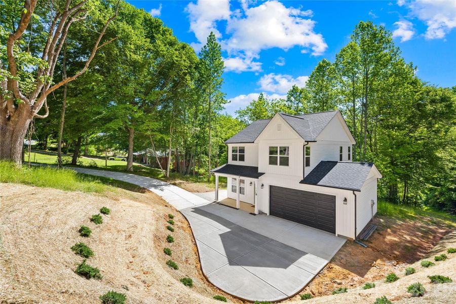 Front exterior of a new home in , Kings Mountain, NC, highlighting curb appeal (Image 22).