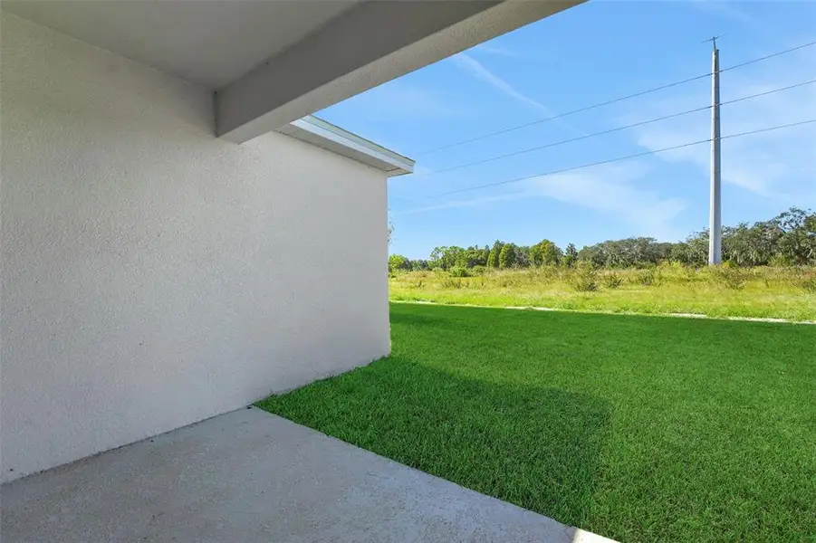 Exterior details and patio area of a home in Willowbrook North, Winter Haven (Image 3).