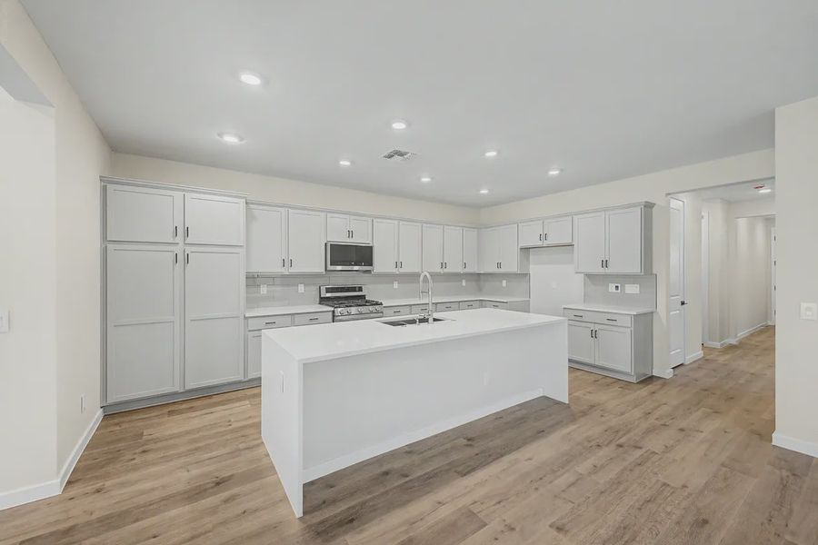 Furnished interior view inside a new home in Avanti at Granite Vista, Waddell (Image 6).