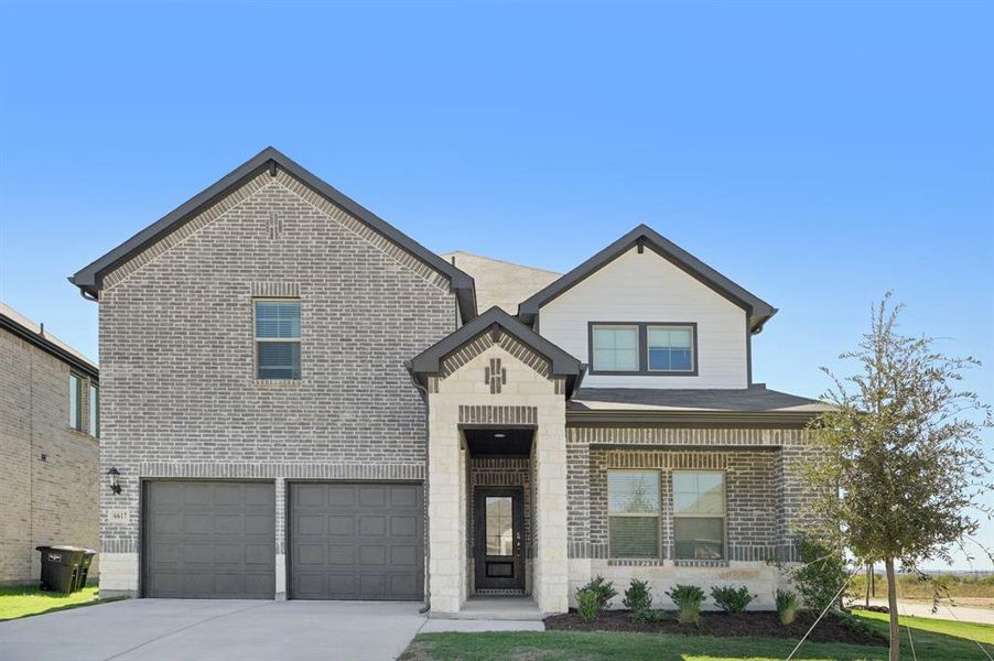 Front exterior of a new home in Tesoro at Chisholm Trail Ranch, Crowley, TX, highlighting curb appeal (Image 1). Front exterior of a new home in Tesoro at Chisholm Trail Ranch, Crowley, TX, highlighting curb appeal (Image 1).