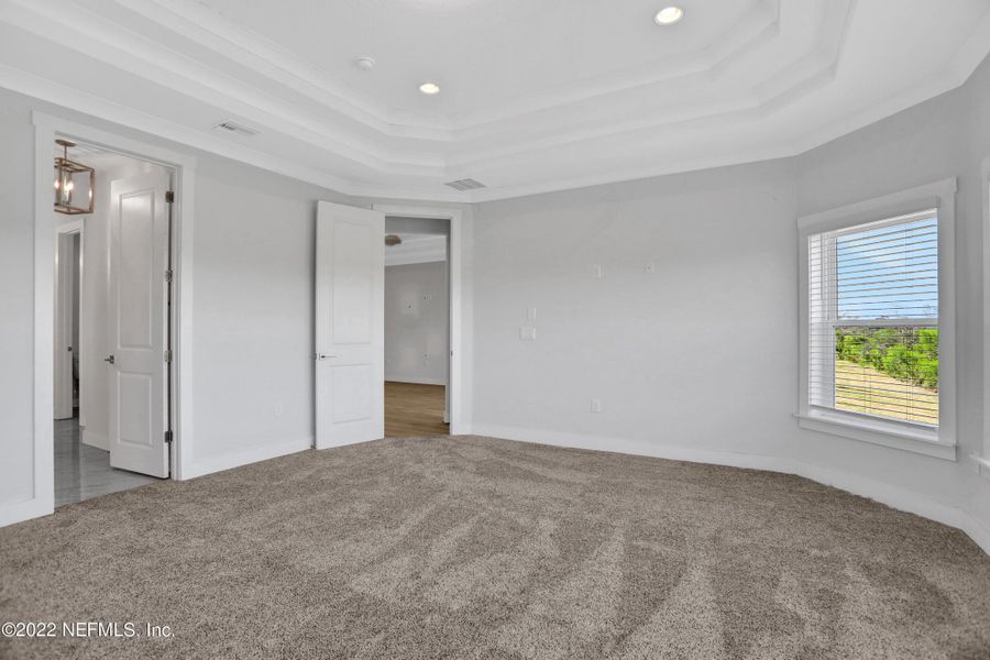 Spacious, unfurnished interior of a new home in TrailMark, St. Augustine (Image 32).