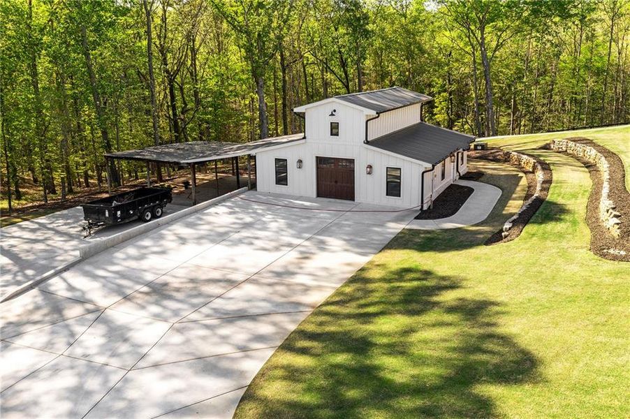Front exterior of a new home in , Canton, GA, highlighting curb appeal (Image 26).