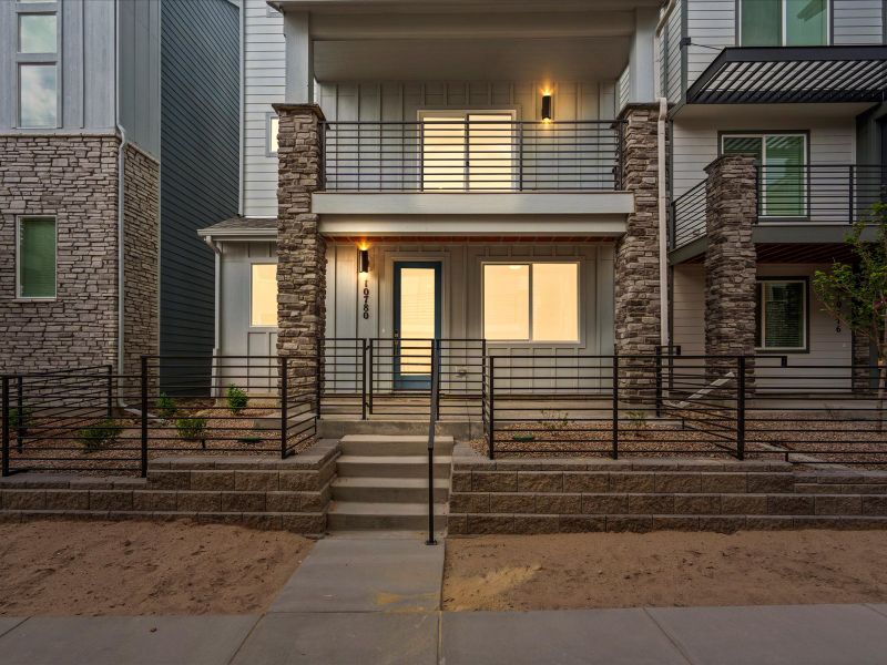 Front exterior of a new home in Parkside at Victory Ridge, Colorado Springs, CO, highlighting curb appeal (Image 1).