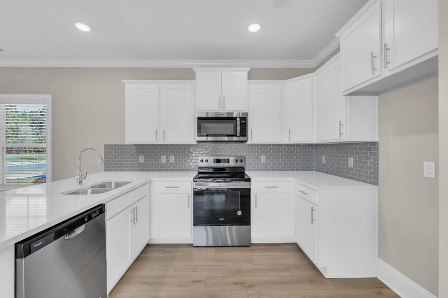 Representative furnished interior of a home built from the Ocala II by Great Southern Homes in White Oak Estates, Conway (Image 6).