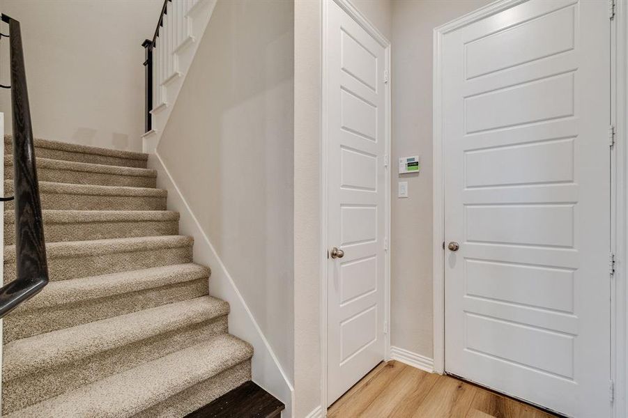 Foyer featuring wood-type flooring