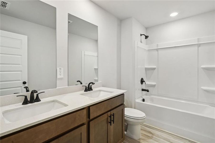 Furnished interior view inside a new home in Martin Springs - Estate Series, Lawrenceville (Image 9).