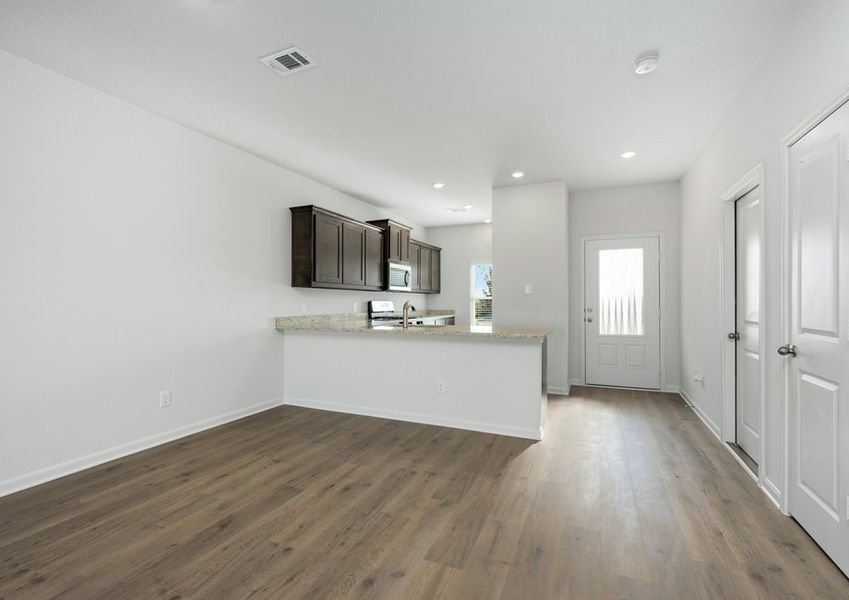 The dining room sits right off of the kitchen for easy access.