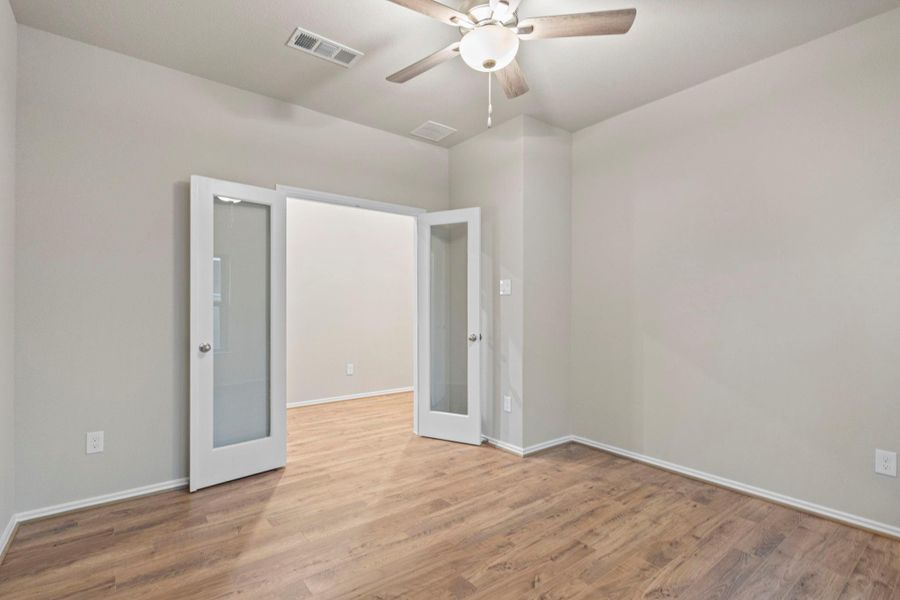 Spacious, unfurnished interior of a new home in Bridgeland, Cypress (Image 13).