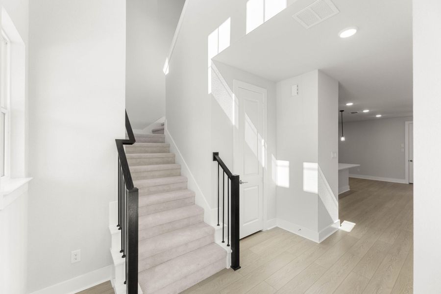 Spacious, unfurnished interior of a new home in Terrace Collection at Harvest, Argyle (Image 11).