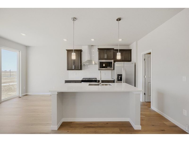 Furnished interior view inside a new home in Farmstead, Berthoud (Image 5).