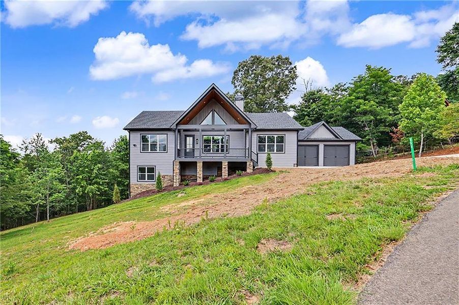 Front exterior of a new home in , Morganton, GA, highlighting curb appeal (Image 27). Front exterior of a new home in , Morganton, GA, highlighting curb appeal (Image 27).
