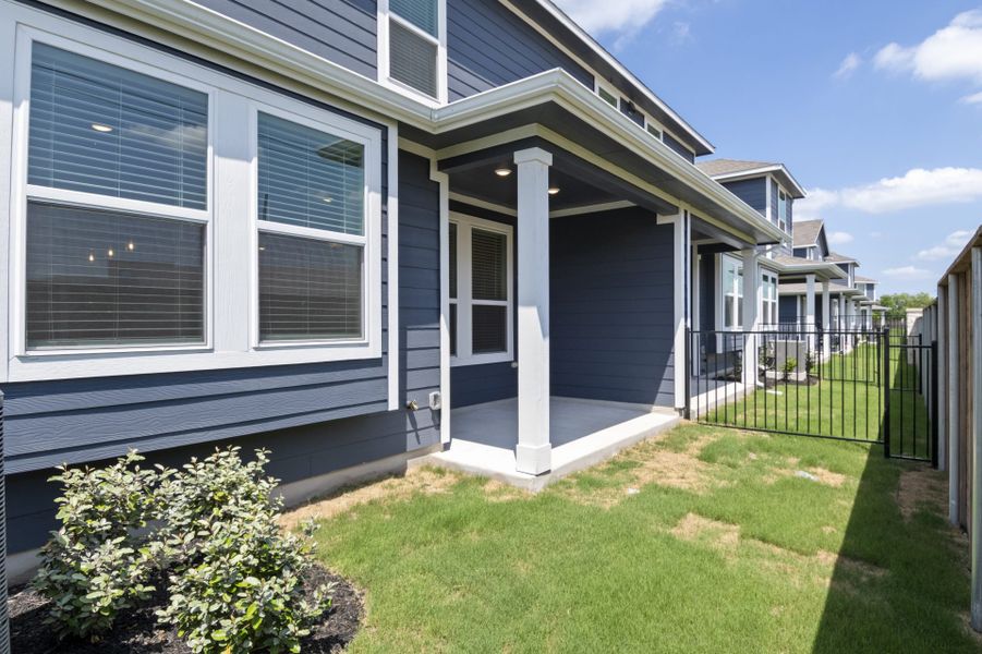 Front exterior of a new home in Center 45, Round Rock, TX, highlighting curb appeal (Image 22).