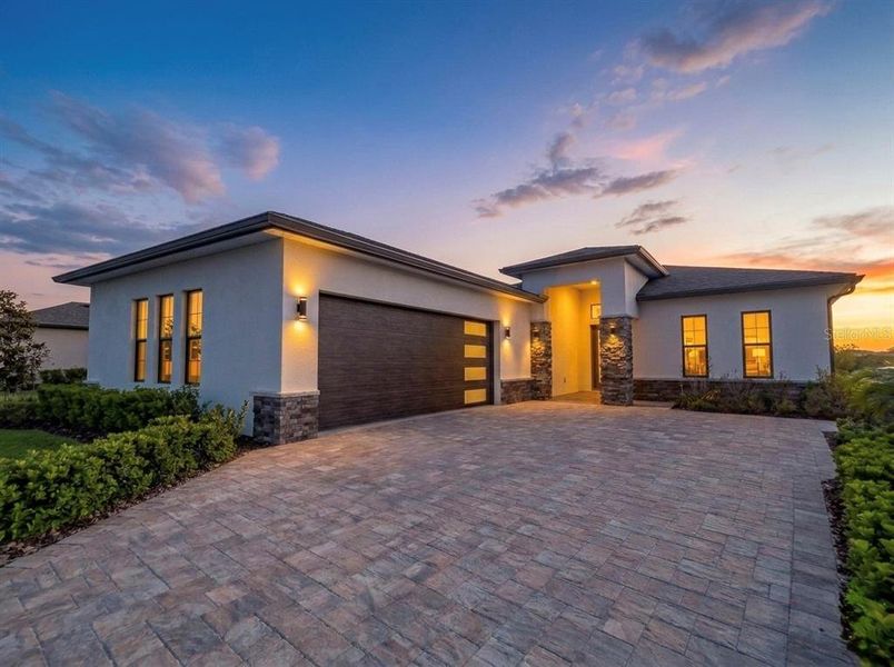 Front exterior of a new home in , Auburndale, FL, highlighting curb appeal (Image 22).