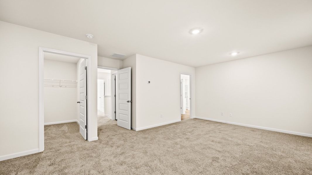 Representative unfurnished interior of a home built from the Flora by D.R. Horton in Poplar Preserve, Newnan (Image 19).