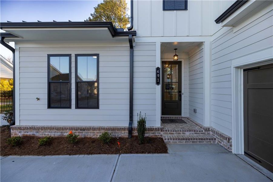 Exterior details and patio area of a home in Promenade at Sawnee Village, Cumming (Image 4).