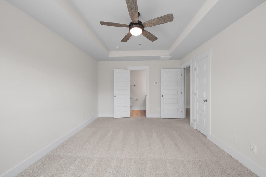 Photo is of a similar home