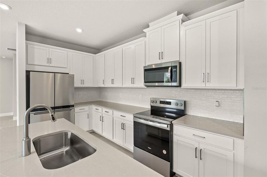 Furnished interior view inside a new home in Brightmore at Wellen Park, Venice (Image 5).