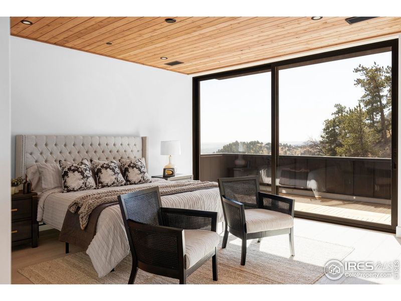 The home's top floor is dedicated to the private owner's retreat, featuring a king-size bedroom with a linear gas fireplace that opens to a stunning private deck. The home's top floor is dedicated to the private owner's retreat, featuring a king-size bedroom with a linear gas fireplace that opens to a stunning private deck.