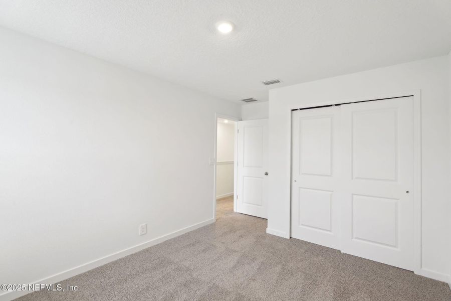 Spacious, unfurnished interior of a new home in Lakes at Bella Lago - Signature Series, Green Cove Springs (Image 23). Spacious, unfurnished interior of a new home in Lakes at Bella Lago - Signature Series, Green Cove Springs (Image 23).