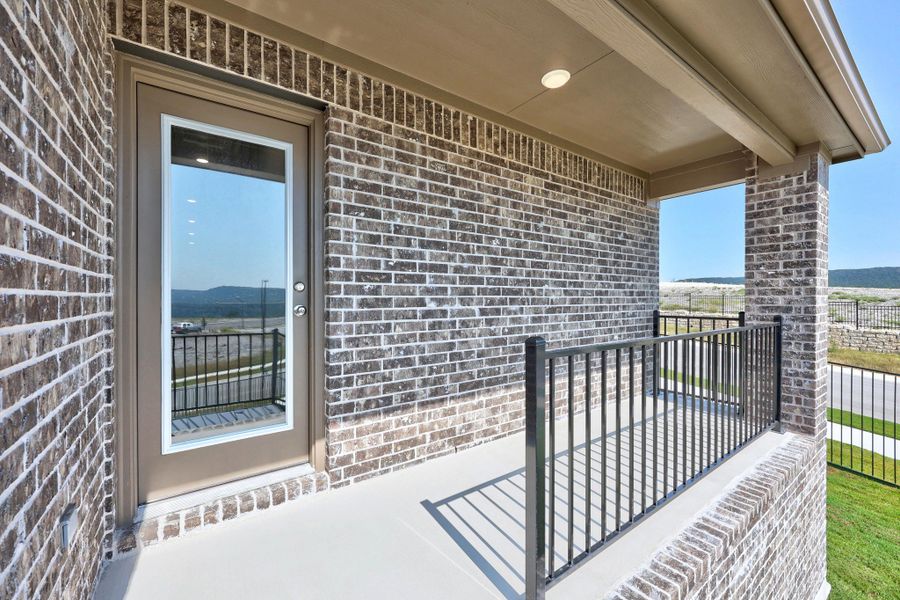 Exterior details and patio area of a home in Lakeside at Tessera, Lago Vista (Image 4).