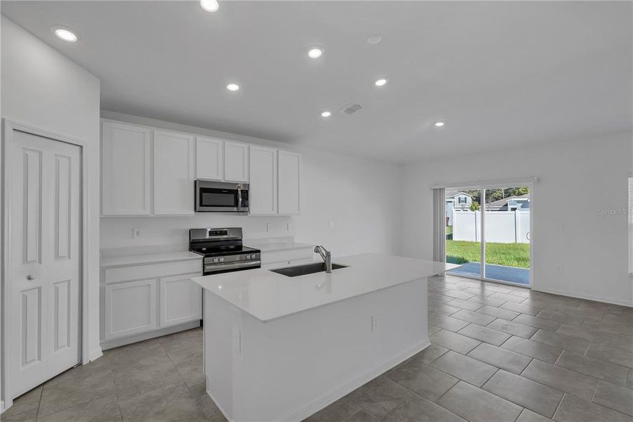 Furnished interior view inside a new home in Knightsbridge, Kissimmee (Image 4).