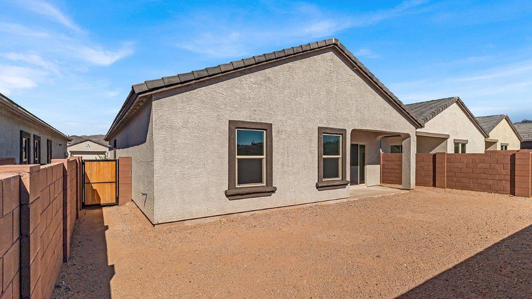 Representative exterior photo of a completed home built from the Harris by D.R. Horton in The Oasis at Rocking K, Vail, AZ (Image 25).