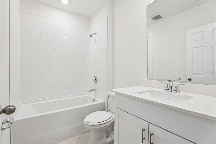 Furnished interior view inside a new home in Lake Deer Estates - Signature Series, Poinciana (Image 6).