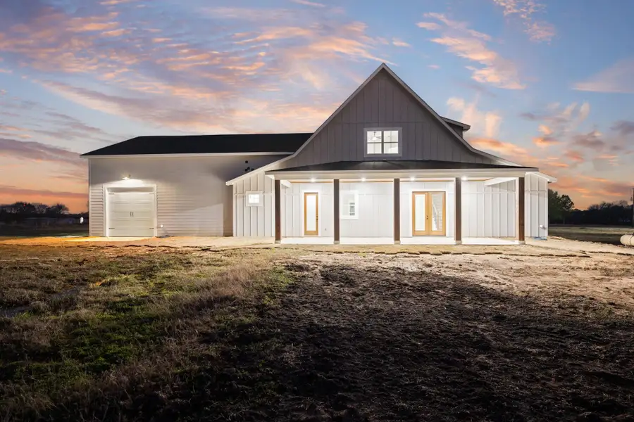 Exterior details and patio area of a home in , New Waverly (Image 3).