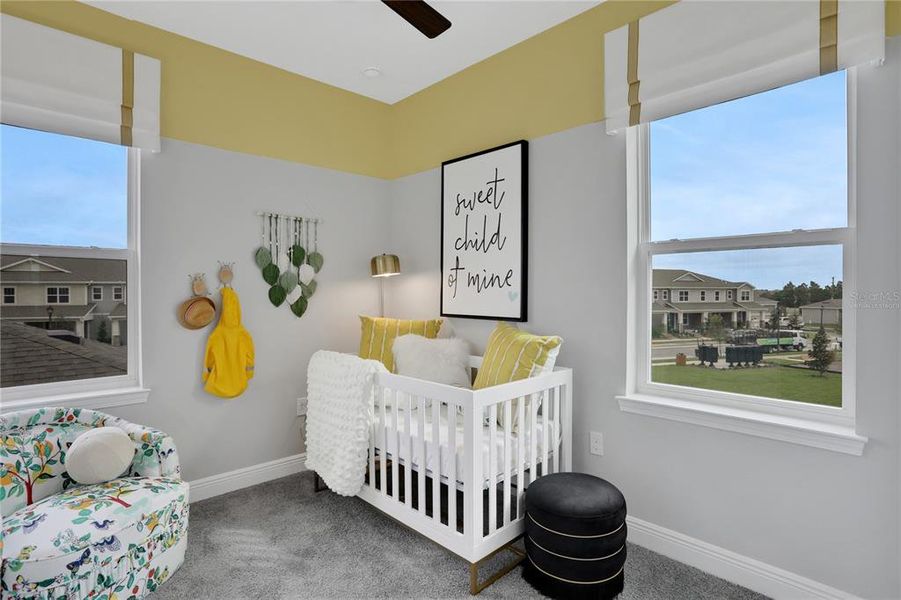 Furnished interior view inside a new home in Serenade at Ovation, Winter Garden (Image 15).