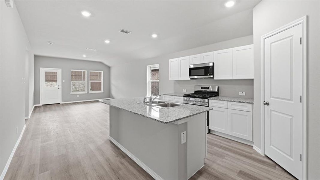 Kitchen- All Home and community information, including pricing, included features, terms, availability and amenities, are subject to change at any time without notice or obligation. All Drawings, pictures, photographs, video, square footages, floor plans, elevations, features, colors and sizes are approximate for illustration purposes only and will vary from the homes as built.