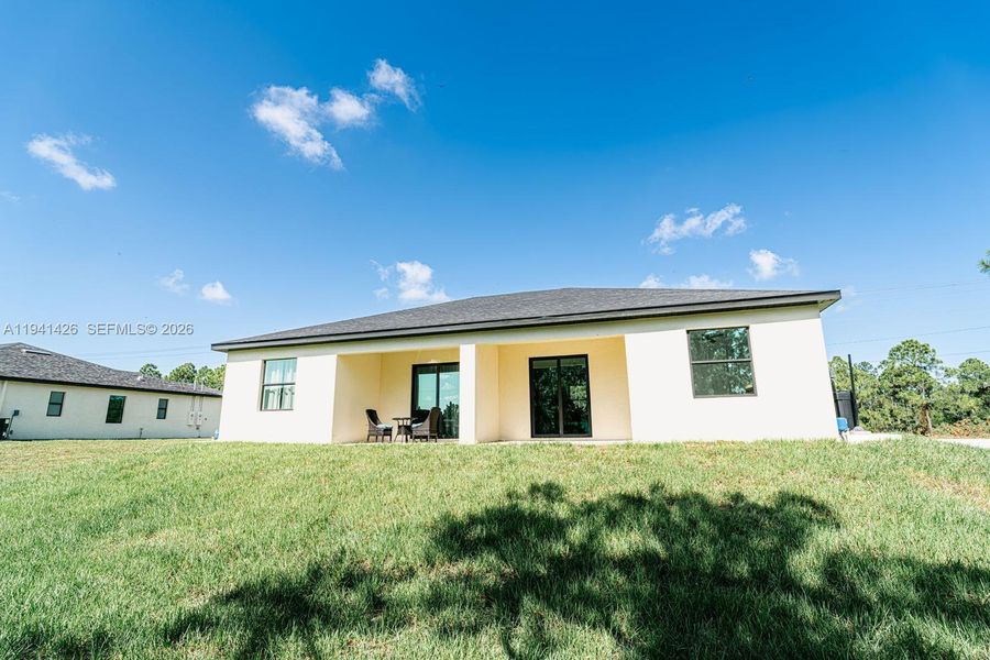 Exterior details and patio area of a home in , Lehigh Acres (Image 4).