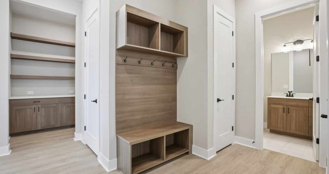 Furnished interior view inside a new home in 6 Creeks, Kyle (Image 9).