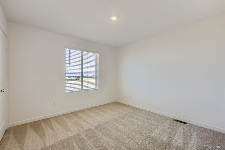 Spacious, unfurnished interior of a new home in Copper Chase: The Celestial Collection, Colorado Springs (Image 9).