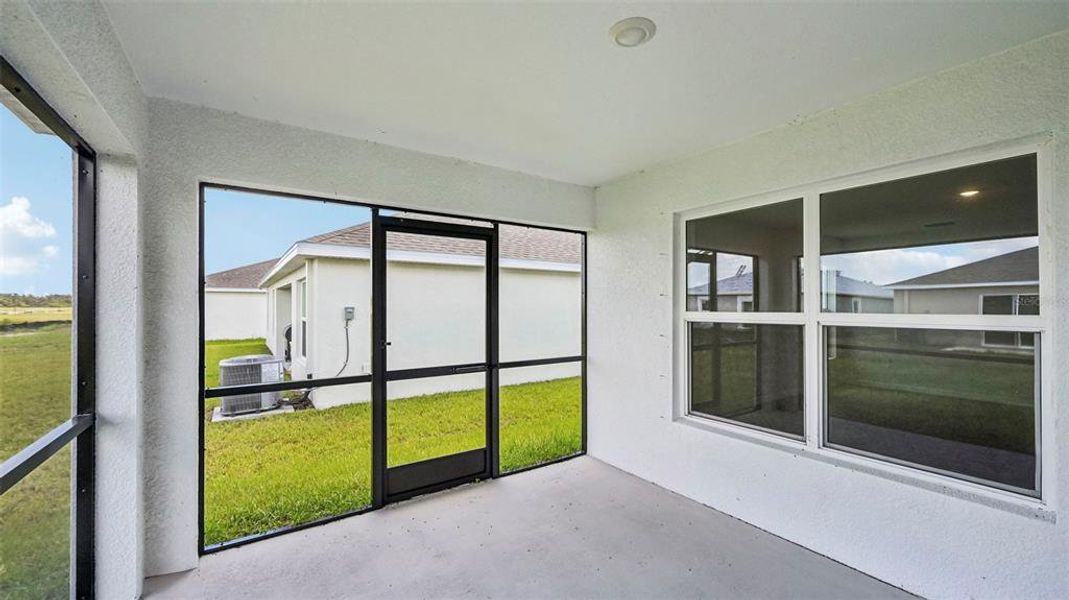 Exterior details and patio area of a home in Rye Crossing, Parrish (Image 3).