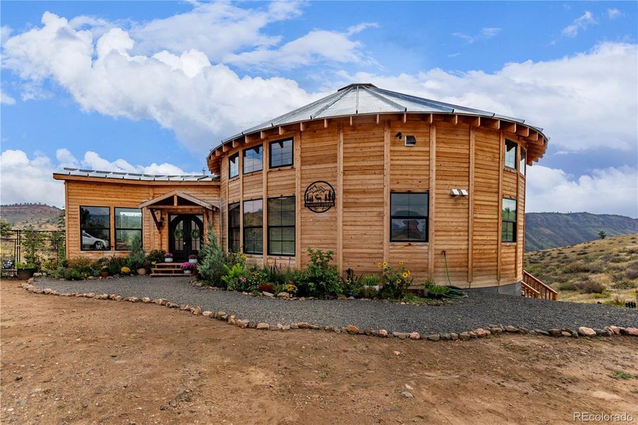 Front exterior of a new home in , Lyons, CO, highlighting curb appeal (Image 29).