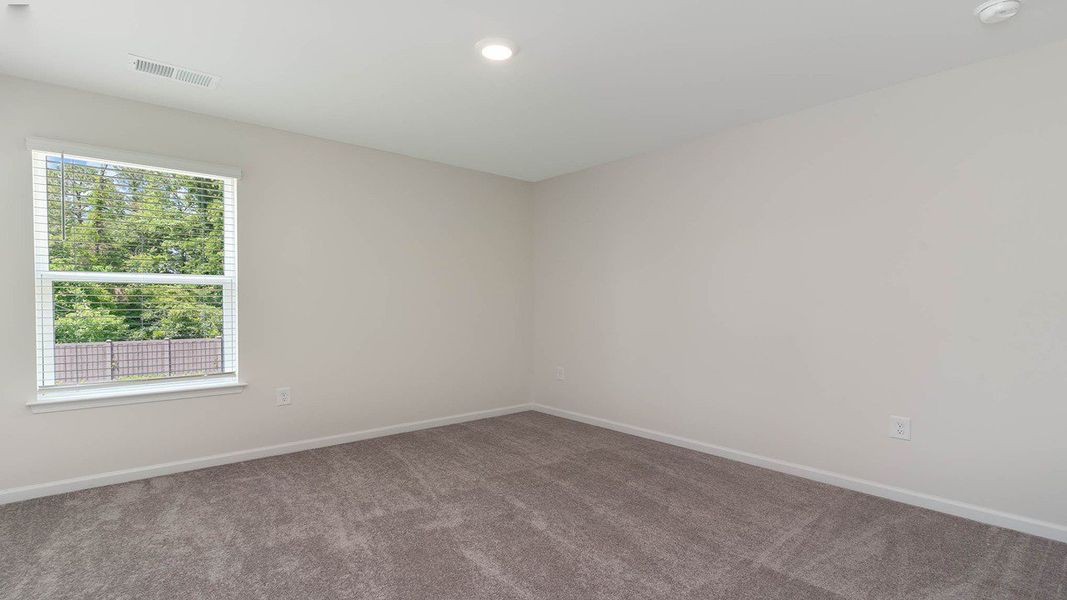 Spacious, unfurnished interior of a new home in Dove Crossing, Conway (Image 26).