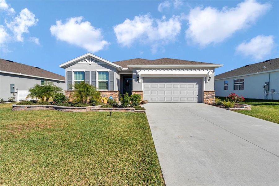 Front exterior of a new home in JB Ranch, Ocala, FL, highlighting curb appeal (Image 22). Front exterior of a new home in JB Ranch, Ocala, FL, highlighting curb appeal (Image 22).