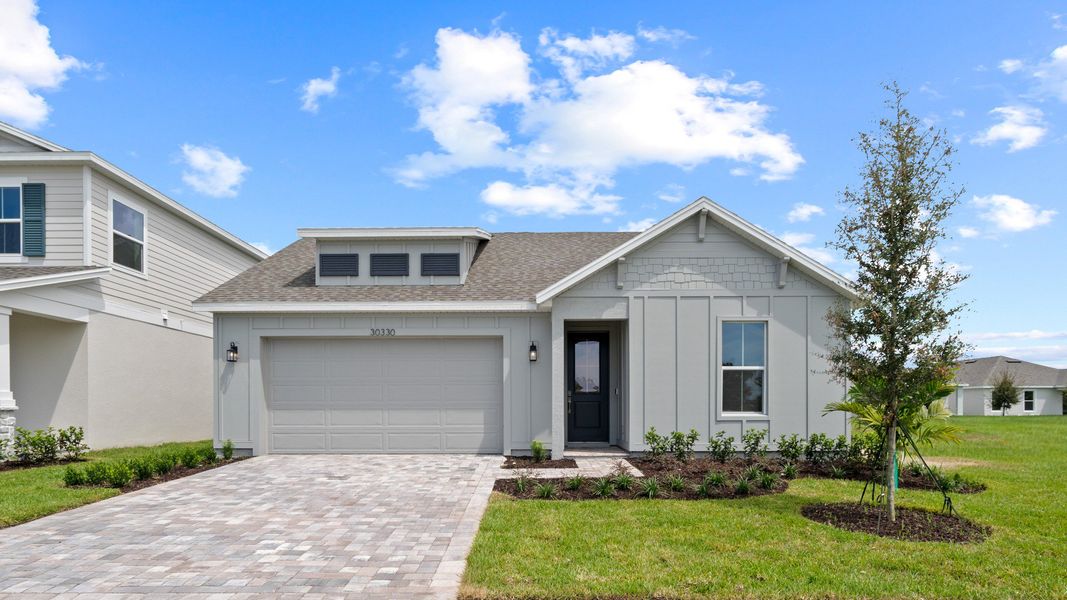 New Home in Longleaf Floor plan in Farmhouse Elevation Front Exterior by DRB Homes in Lakeside at Satilla