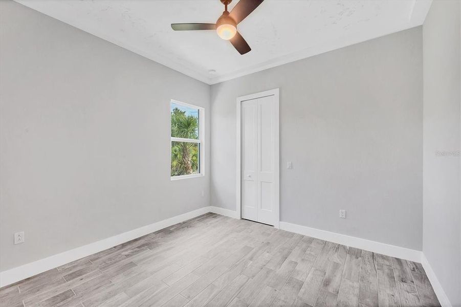 Spacious, unfurnished interior of a new home in , Port Charlotte (Image 27).