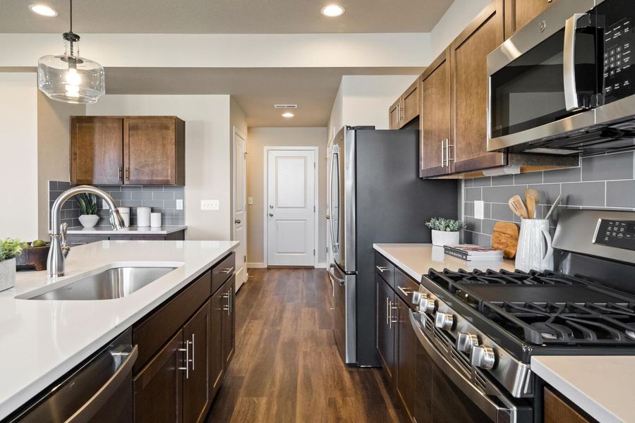 Representative furnished interior of a home built from the The Bayberry by Challenger Homes in Sky Ranch - Highland Collection, Watkins (Image 7).