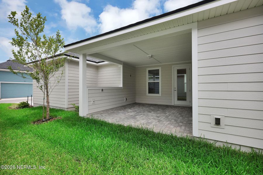 Exterior details and patio area of a home in Seabrook Village at Seabrook, Nocatee (Image 27).