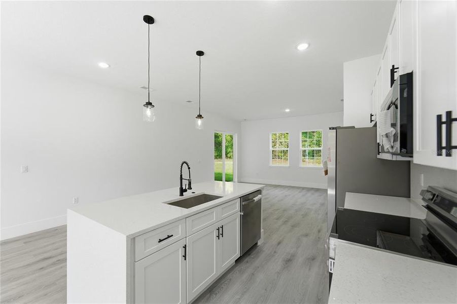 Furnished interior view inside a new home in , Dunnellon (Image 7).