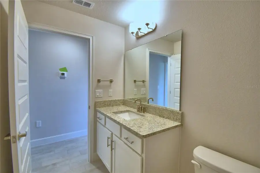 Furnished interior view inside a new home in Lake Juliana Estates, Auburndale (Image 3).