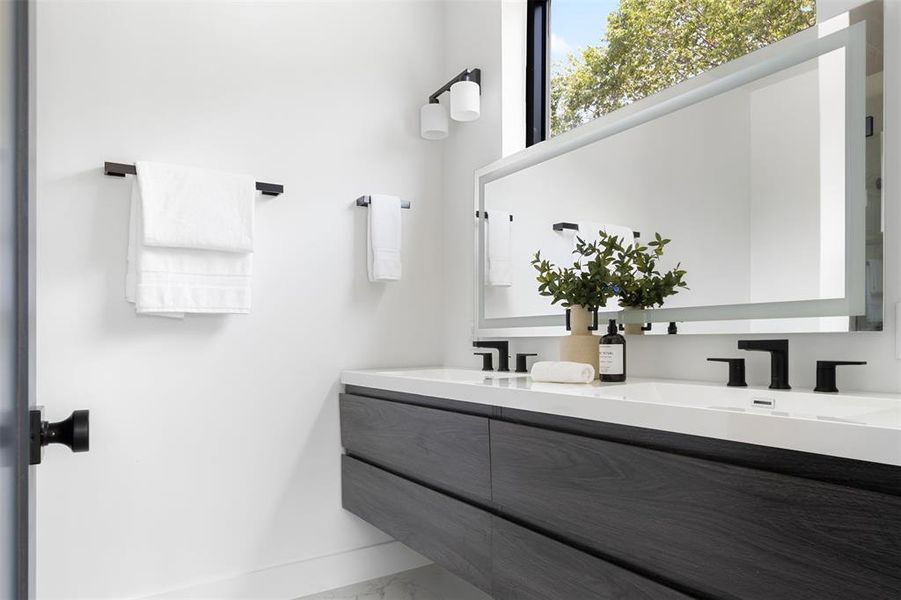 Bathroom with dual bowl vanity