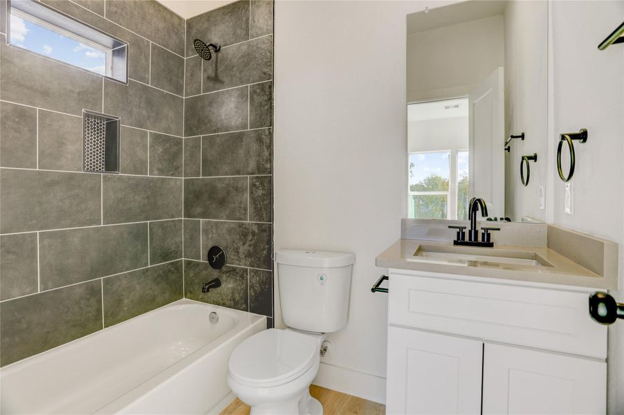 Upstairs en suite bath connects to 5th bedroom.