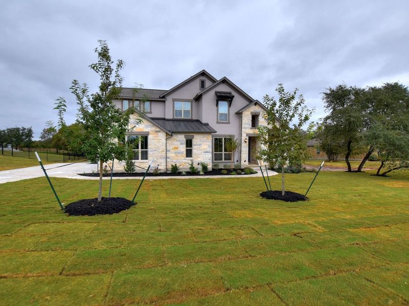 Representative exterior photo of a completed home built from the Madera II by Giddens Homes in Scofield Farms Estates, Georgetown, TX (Image 59).