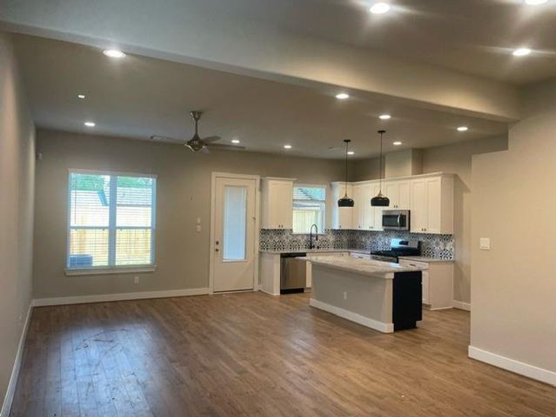 Living room, dining and kitchen open floor plan