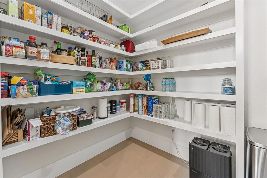 Spacious pantry with built in shelving Spacious pantry with built in shelving